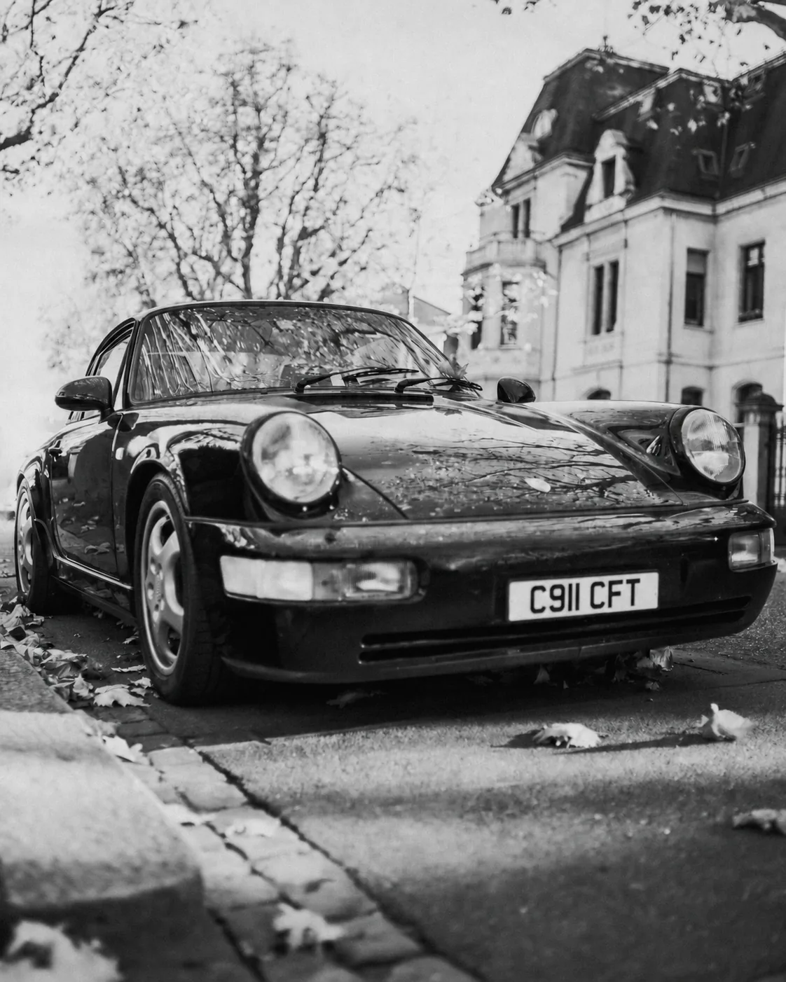 Classic Porsche in a monochrome street scene